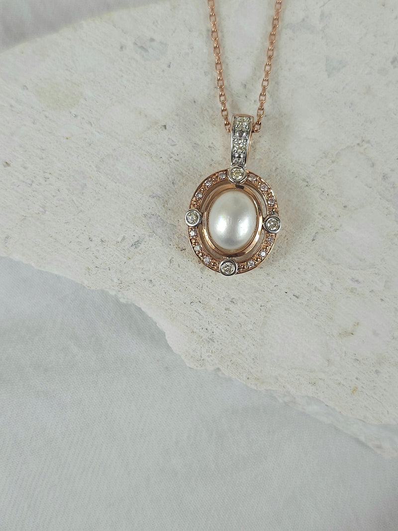 9ct Rose and White 'Pink Caviar' Argyle Diamond and Mabe Pearl enhancer, 0.24cts total.