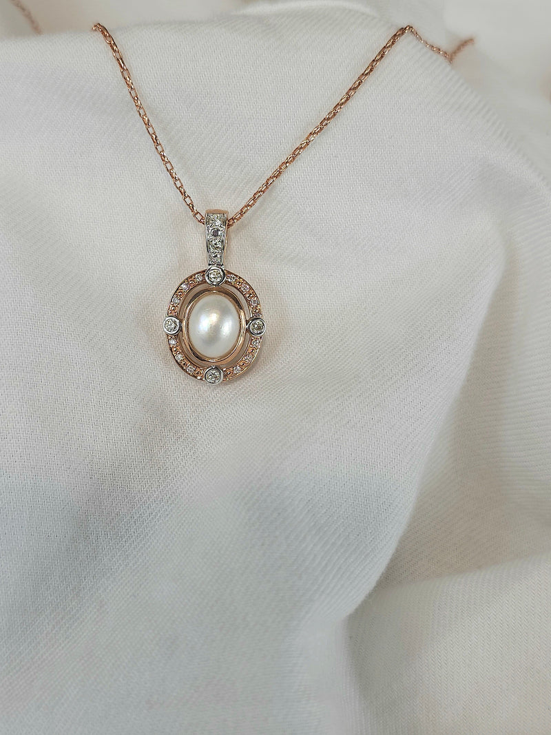 9ct Rose and White 'Pink Caviar' Argyle Diamond and Mabe Pearl enhancer, 0.24cts total.