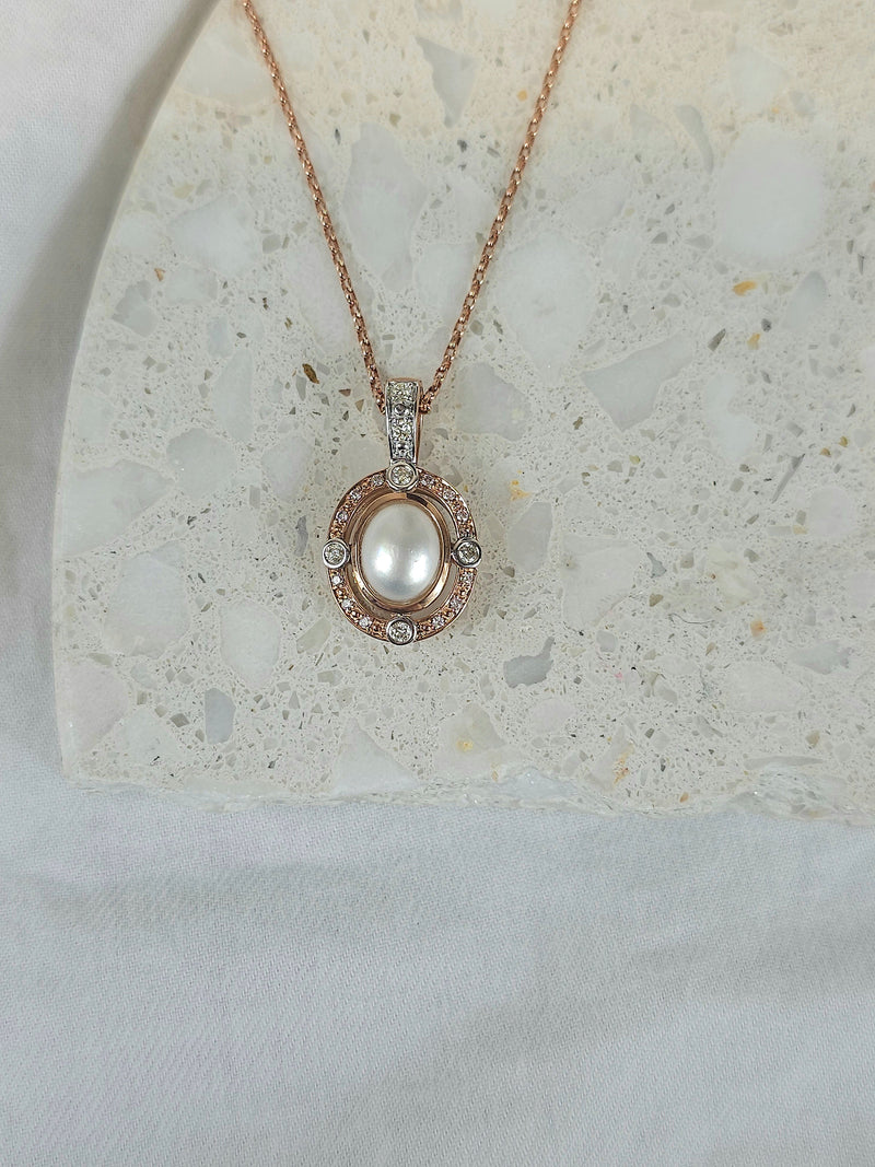9ct Rose and White 'Pink Caviar' Argyle Diamond and Mabe Pearl enhancer, 0.24cts total.