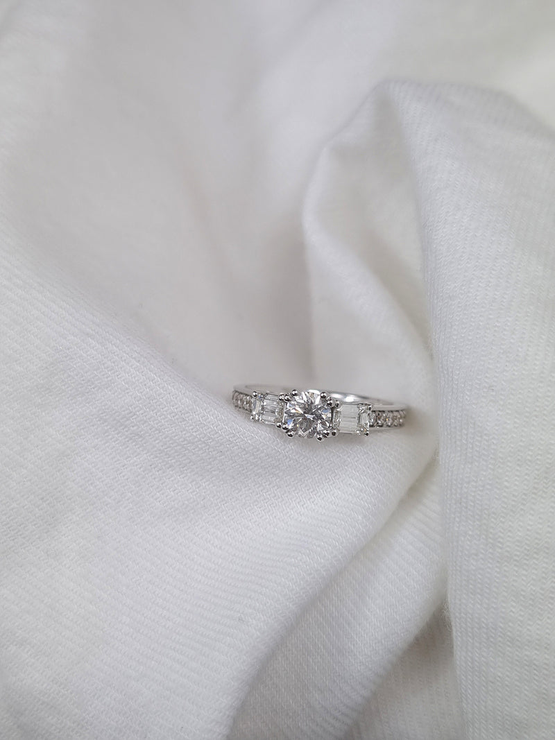 18ct White Gold Round and Emerald Cut Diamond Engagement Ring, 0.40ct Centre