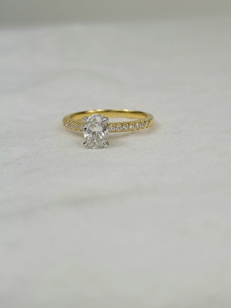 18ct Yellow and White gold Oval engagement ring, 0.72ct centre