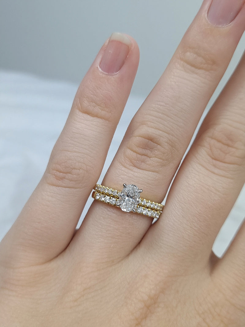 18ct Yellow and White gold Oval engagement ring, 0.72ct centre
