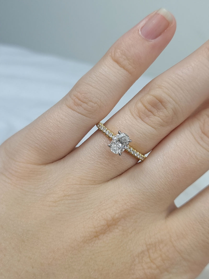 18ct Yellow and White gold Oval engagement ring, 0.72ct centre