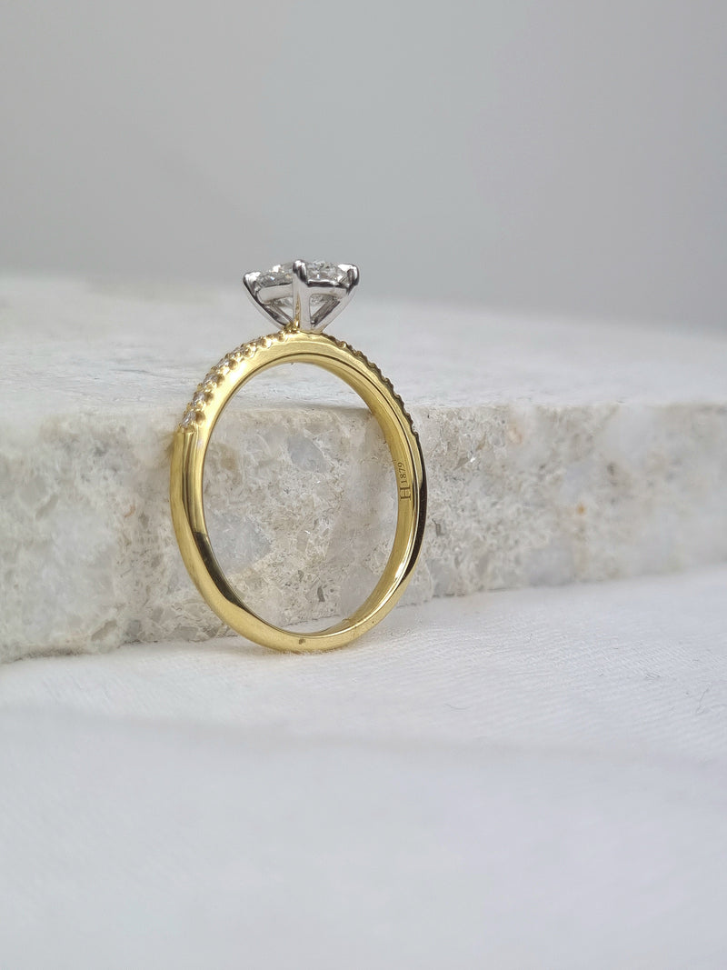 18ct Yellow and White gold Oval engagement ring, 0.72ct centre