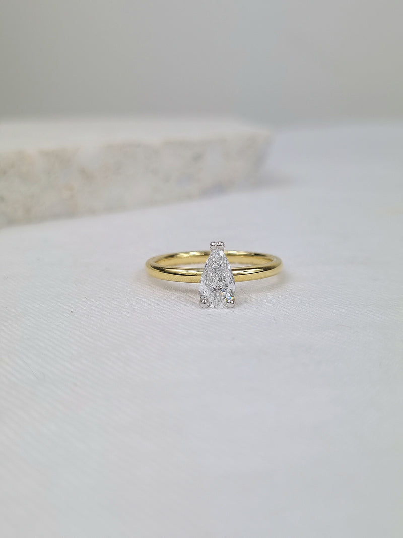 18ct Yellow and White gold Pear engagement ring, 0.71ct centre