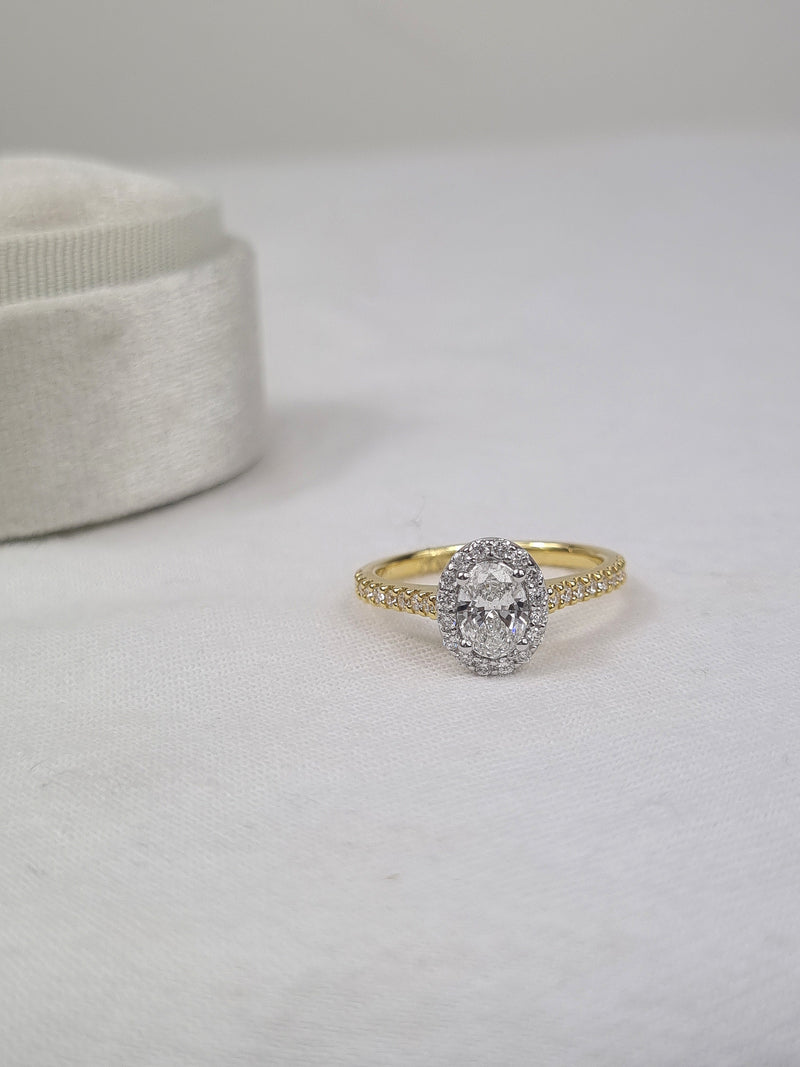 18ct Yellow and White Gold Oval Halo Engagement Ring, 0.56ct centre