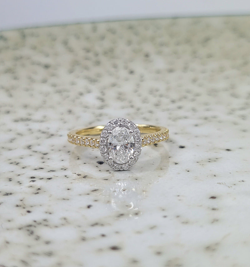 18ct Yellow and White Gold Oval Halo Engagement Ring, 0.56ct centre