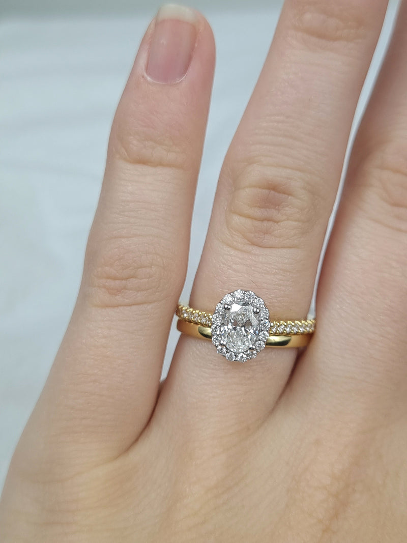 18ct Yellow and White Gold Oval Halo Engagement Ring, 0.56ct centre