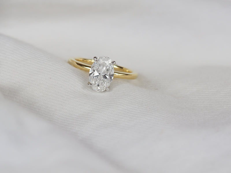18ct Yellow and White Gold Lab-Grown Oval cut Diamond Engagement ring, 1.76ct Centre
