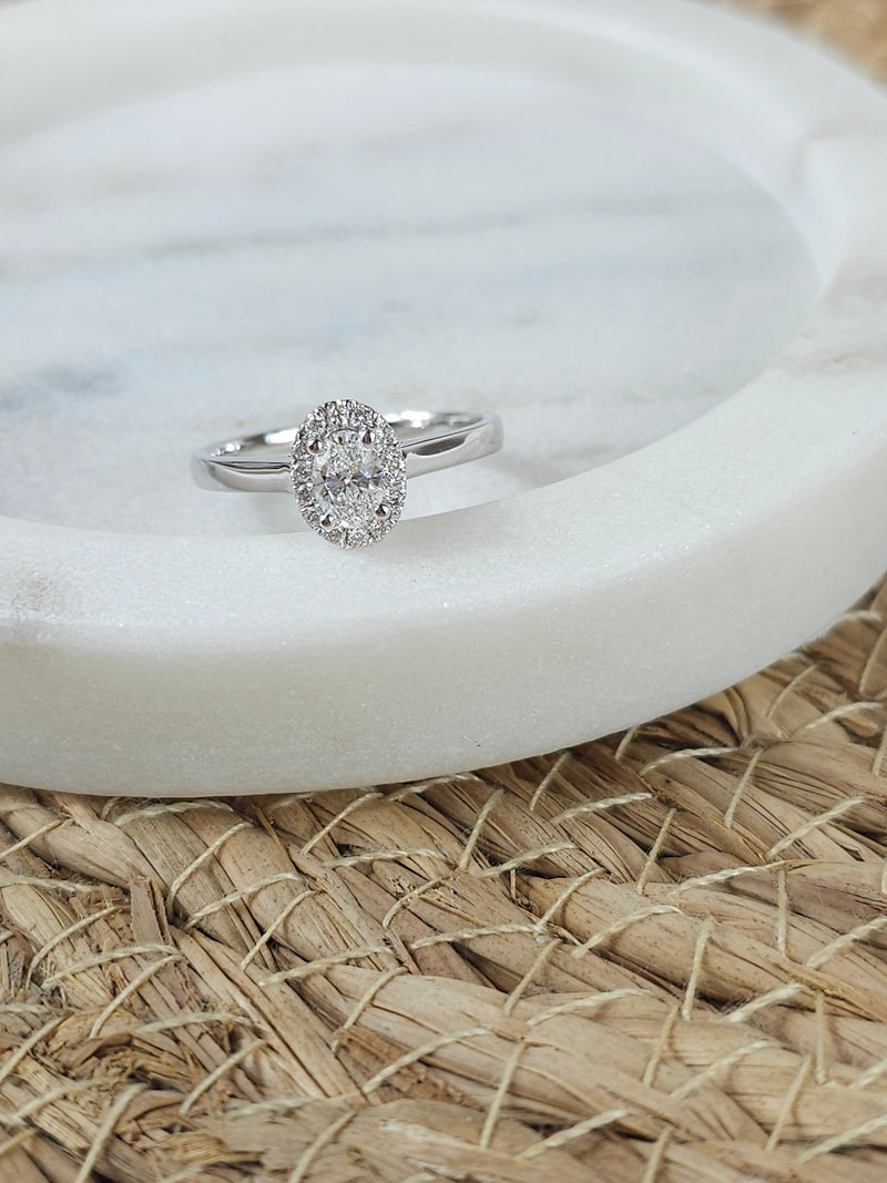 18ct White Gold Oval Cut Diamond ring, 0.40ct centre
