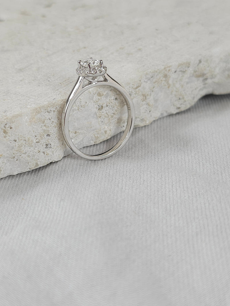 18ct White Gold Oval Cut Diamond ring, 0.40ct centre
